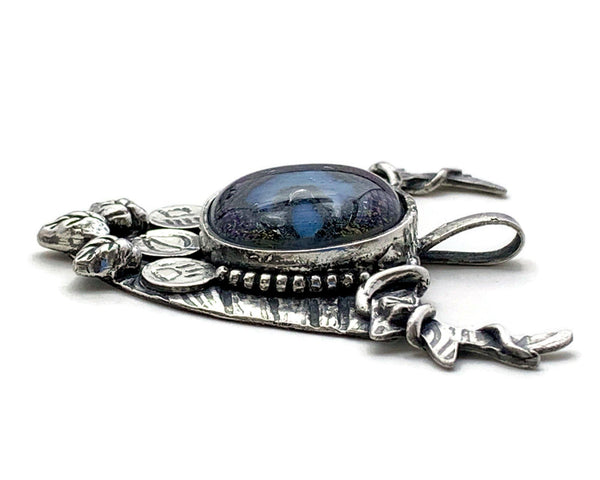 side view of custom silver druid pendant